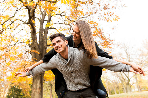 istock Young people having fun in the autumn park 578575640