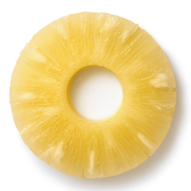 istock Canned pineapple ring isolated on white from above. 578575994