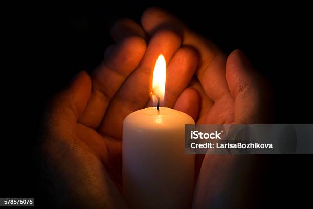 Human Hands Holding A Burning Candle Stock Photo - Download Image Now - Candle, Human Hand, Backgrounds