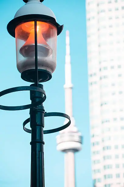 lamp post on street and cn tower background