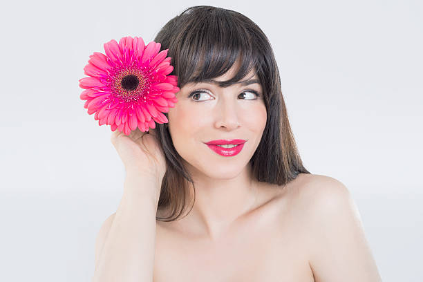 istock Girl with a flower 578582716