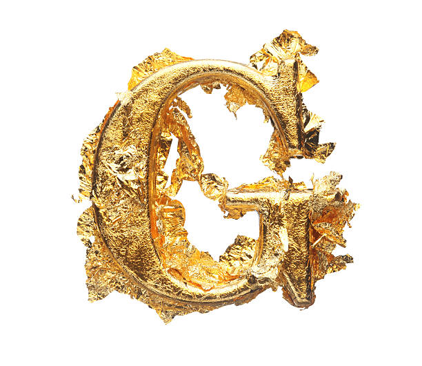 istock Alphabet and numbers in rough gold leaf 578585320