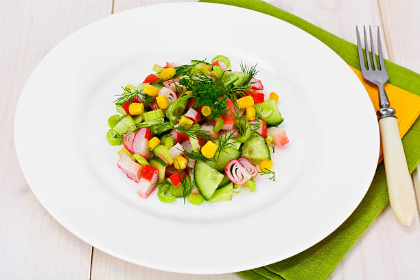 istock Salad of Celery, Crab Stick, Cucumber, Corn and Dill 578586568