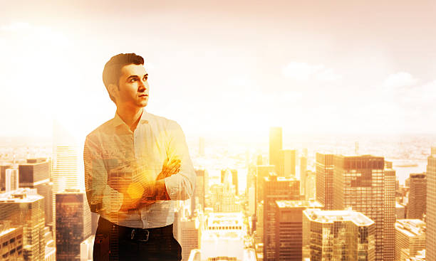 istock Thoughtful man on city background 578587668