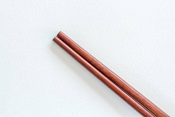 istock Wooden chopsticks on White paper background 578593332