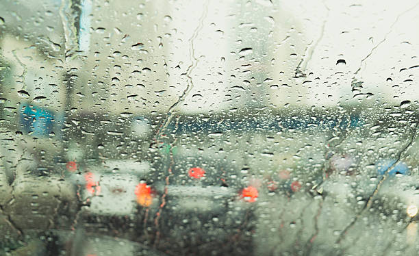 istock Abstract traffic in raining day. View from car seat. Background 578593976