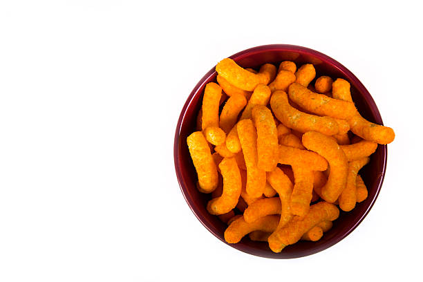 Bowl of Cheese Puffs stock photo