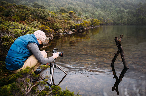 istock Photographer taking photographs 578595162