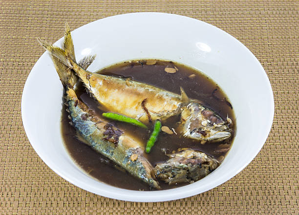 istock mackerel fish boiled with Thai native sauce 578595918