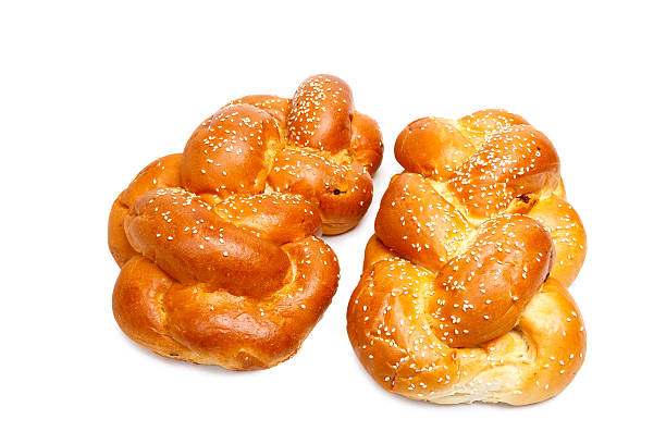 Two shabbat challah Two shabbat challah isolated on white background judiaca stock pictures, royalty-free photos & images