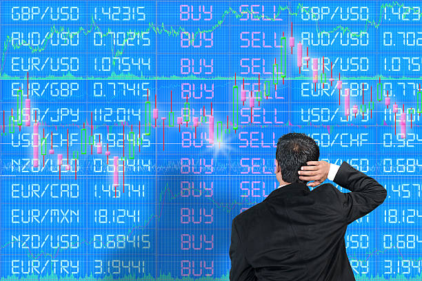 Inexperienced foreign exchange trader scratching head stock photo