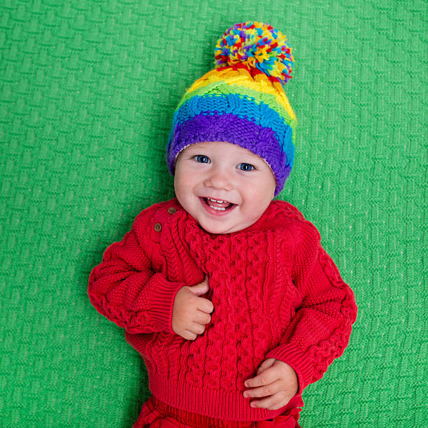 istock Little baby in warm knitted colorful hat 578791738