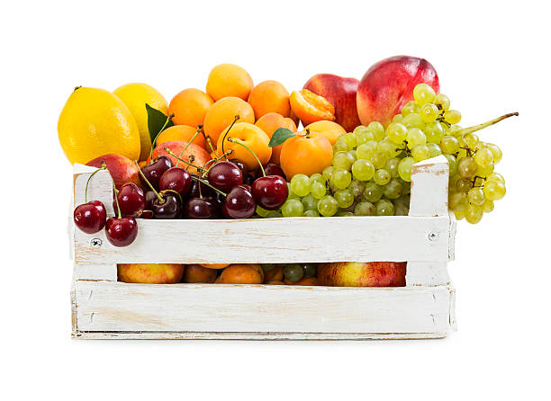 istock Various fruits in wooden box 578791816
