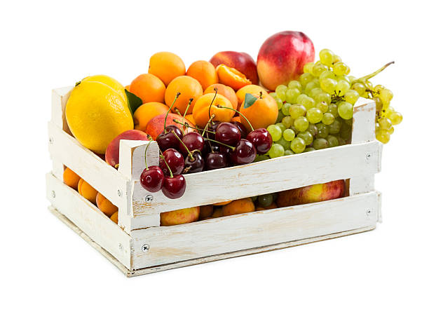 istock Wooden box with different fruits 578791830