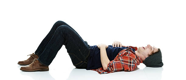 istock Cheerful hipster on the ground laughing 578795628