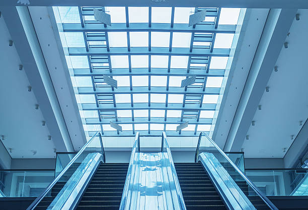 istock Modern Escalator and Stairs in Building 578795728