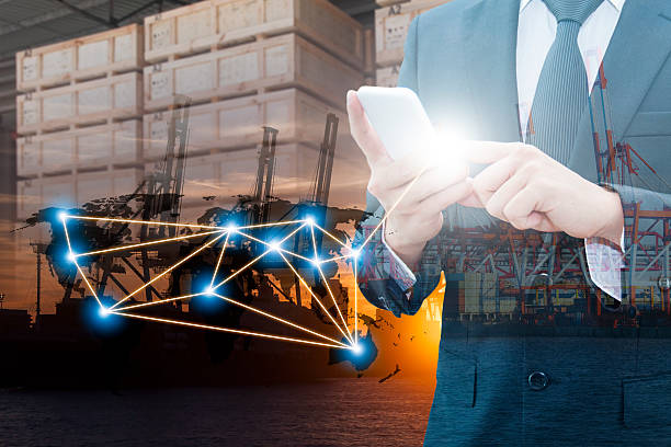 istock Double exposure of businessman using smart phone network connection 578796574