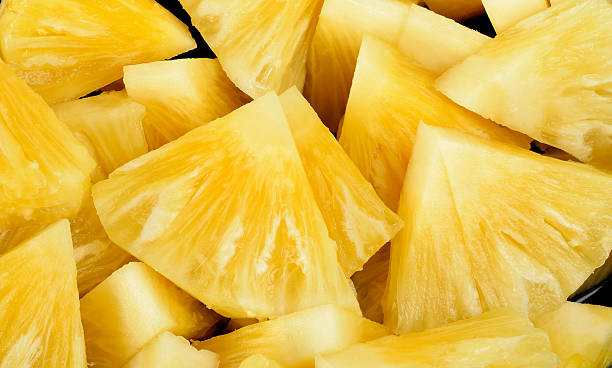 istock Slice of pineapple for background texture 578797698