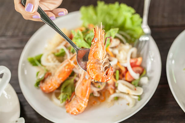 istock seafood salad on wooden table 578798496