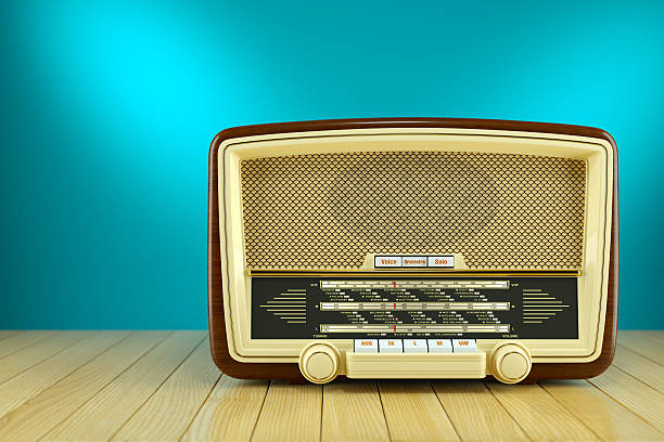 istock Retro radio receiver on wooden table 578800590