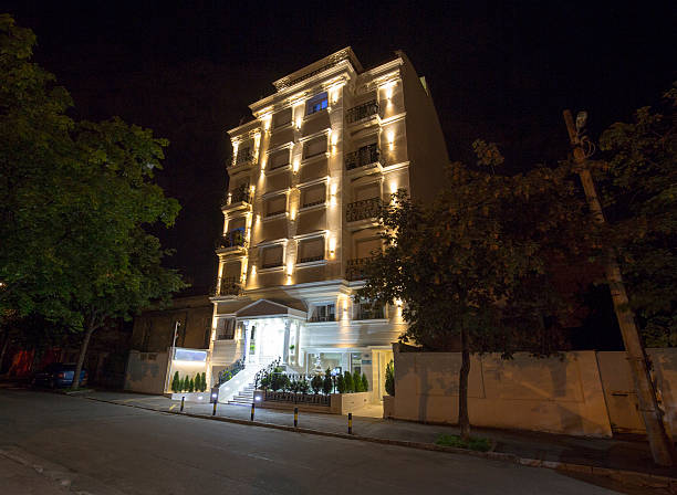 istock Illuminated hotel exterior taken at night 578801354
