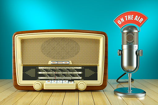 Vintage radio with display showing European cities isolated on a white background