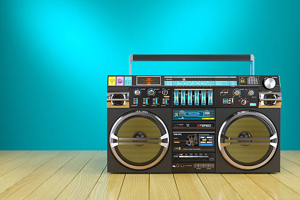 istock Retro cassette tape recorder on wooden table 578805302