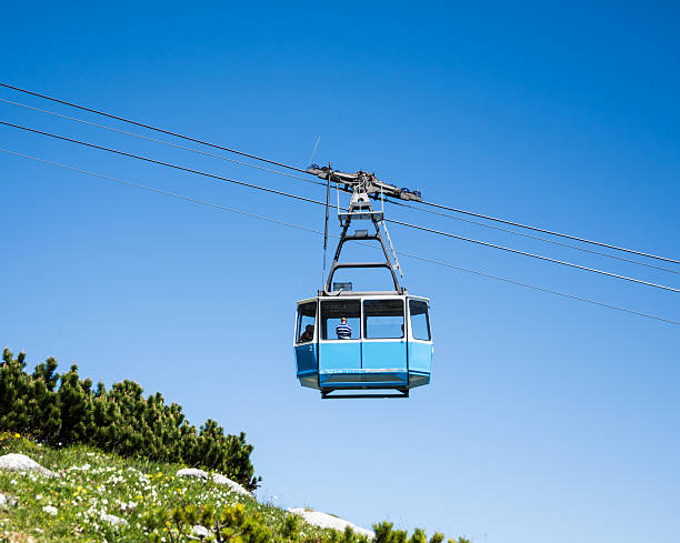 Garmisch, Germany - July 10, 2016: Cable car at the Osterfeldkopf mountain in Garmisch. The Hochalmbahn cableway goes up to 2033 meters.
