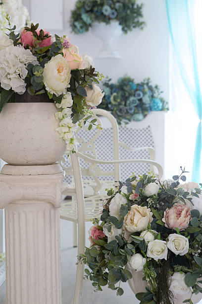 istock beautiful flowers in white vase 578810192