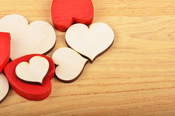 istock Heart on wooden background 578810198