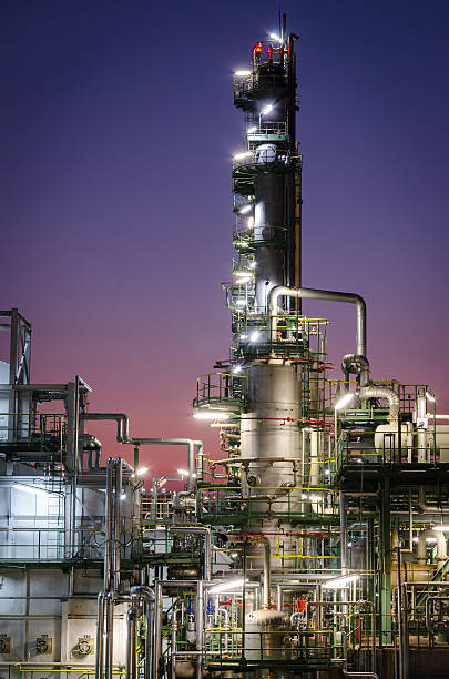 istock Column tower in petrochemical plant at twilight time 578811704