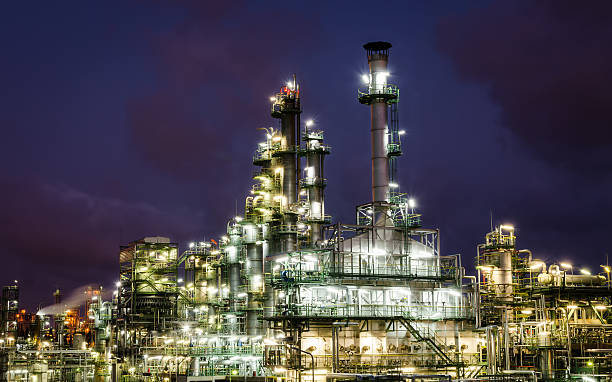 istock Column tower in petrochemical plant at twilight time 578811764