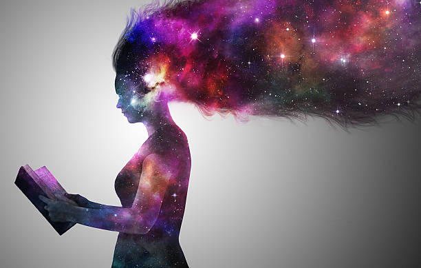 Universe woman A woman in silhoutte reading a book with the universe. telescope photos stock pictures, royalty-free photos & images