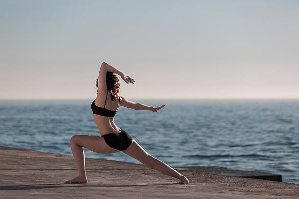 istock woman doing yoga 578817096
