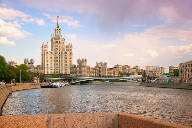 istock Beautiful Stalin skyscraper, Moscow river and river boats 578817860