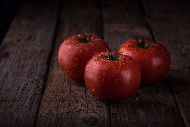 istock tomatoes with drops of water 578818012