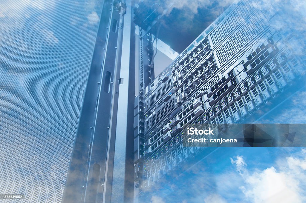 Double exposure of cloud and sky with servers computing technology Double exposure of cloud and sky with servers computing technology in data center creative cloud concept Recovery Stock Photo