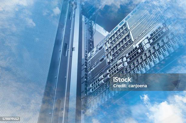 Double Exposure Of Cloud And Sky With Servers Computing Technology Stock Photo - Download Image Now