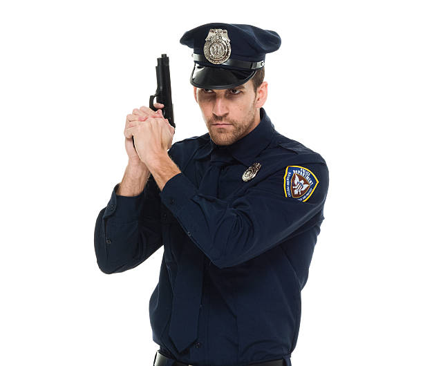 istock Police in action with gun 578820912