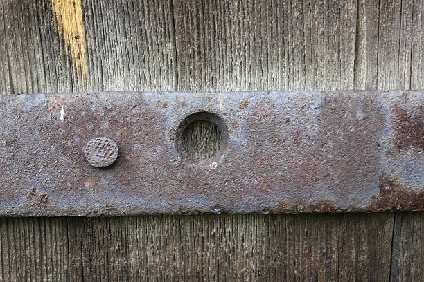 Old wooden door with rusty screw 19961 stock photo