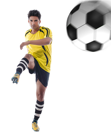 Soccer player in action. Soccer player running with the ball. Soccer. Professional player soccer player dribbles the ball for the winning goal. Isolated. Action