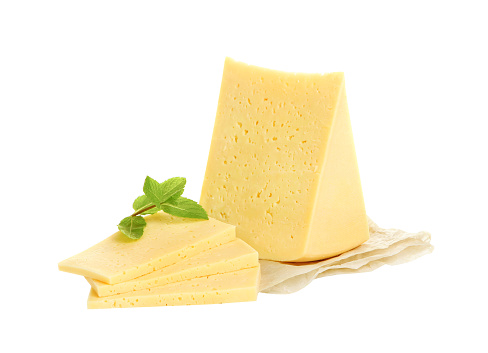 A piece of a swiss hard cheese with herbs