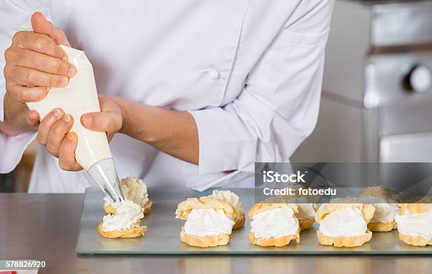 Pastry Chef Decorating Stock Photo - Download Image Now - Icing Bag, Pastry Dough, Chef