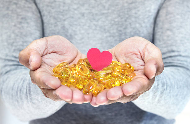 Heart healthy supplement pills stock photo