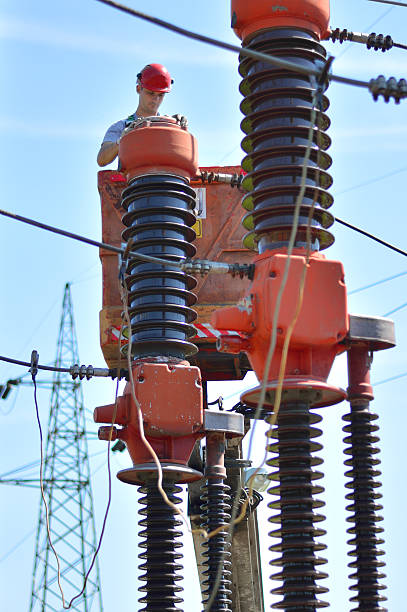 istock Electrician working in power substation 578833400