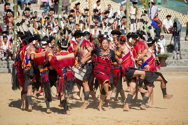 Hornbill Festival in India. Nagaland, India - December 3, 2013: Tribes of Nagaland at the annual Hornbill Festival in Kohima. The Hornbill is also known as the Festival of Festivals’. hornbill stock pictures, royalty-free photos & images