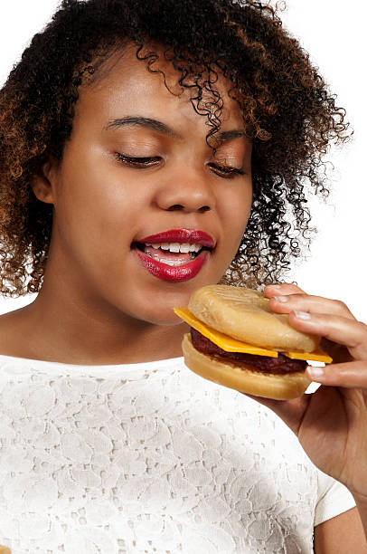 istock Woman with Hamburger 579121866