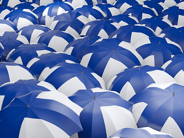 istock Umbrellas with flag of finland 579122912