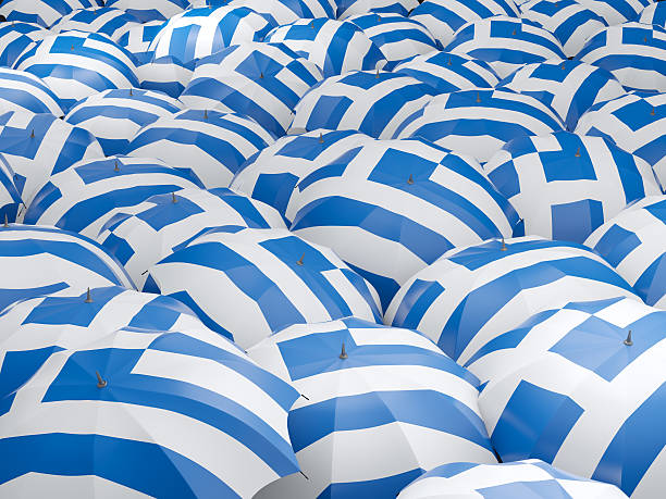 istock Umbrellas with flag of greece 579123332