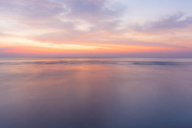 istock Sea wave under twilight sunset sky  with motion blur. 579123496